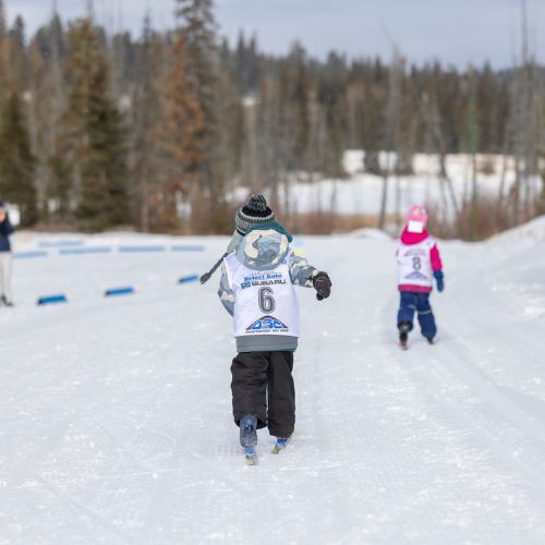 Children competing at the Stake Lake cross country Loppet.